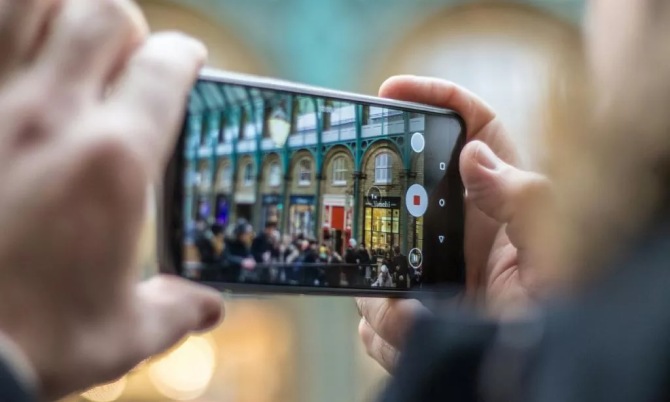  person taking photo with phone
